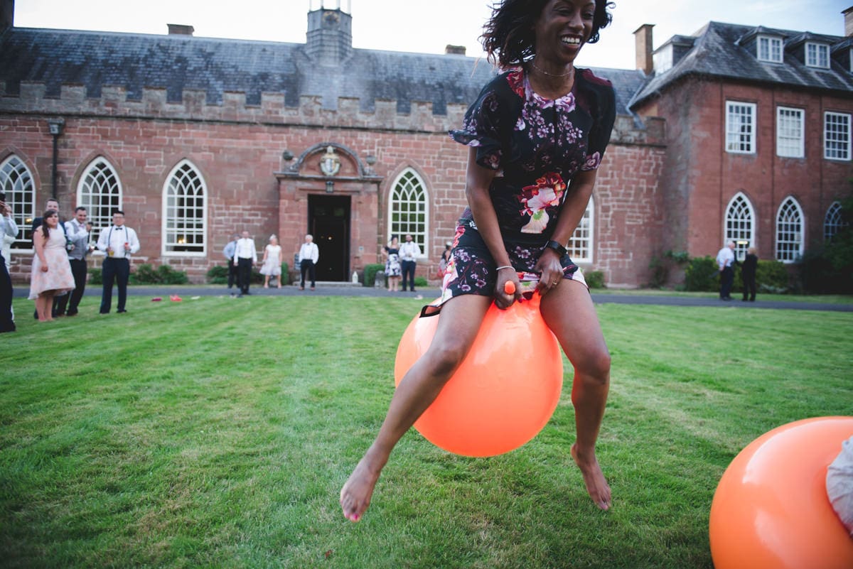 Wedding space hopper race at Hartlebury Castle